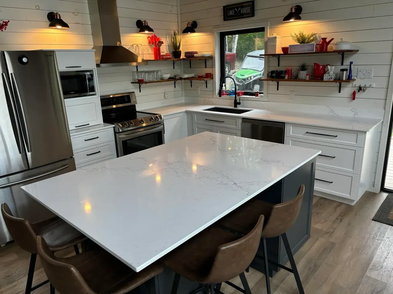 White countertop island in a lake house kitchen