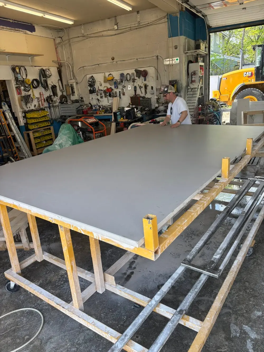 Slab laid out on the shop table before cutting